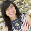 Smiling woman holding her passport
